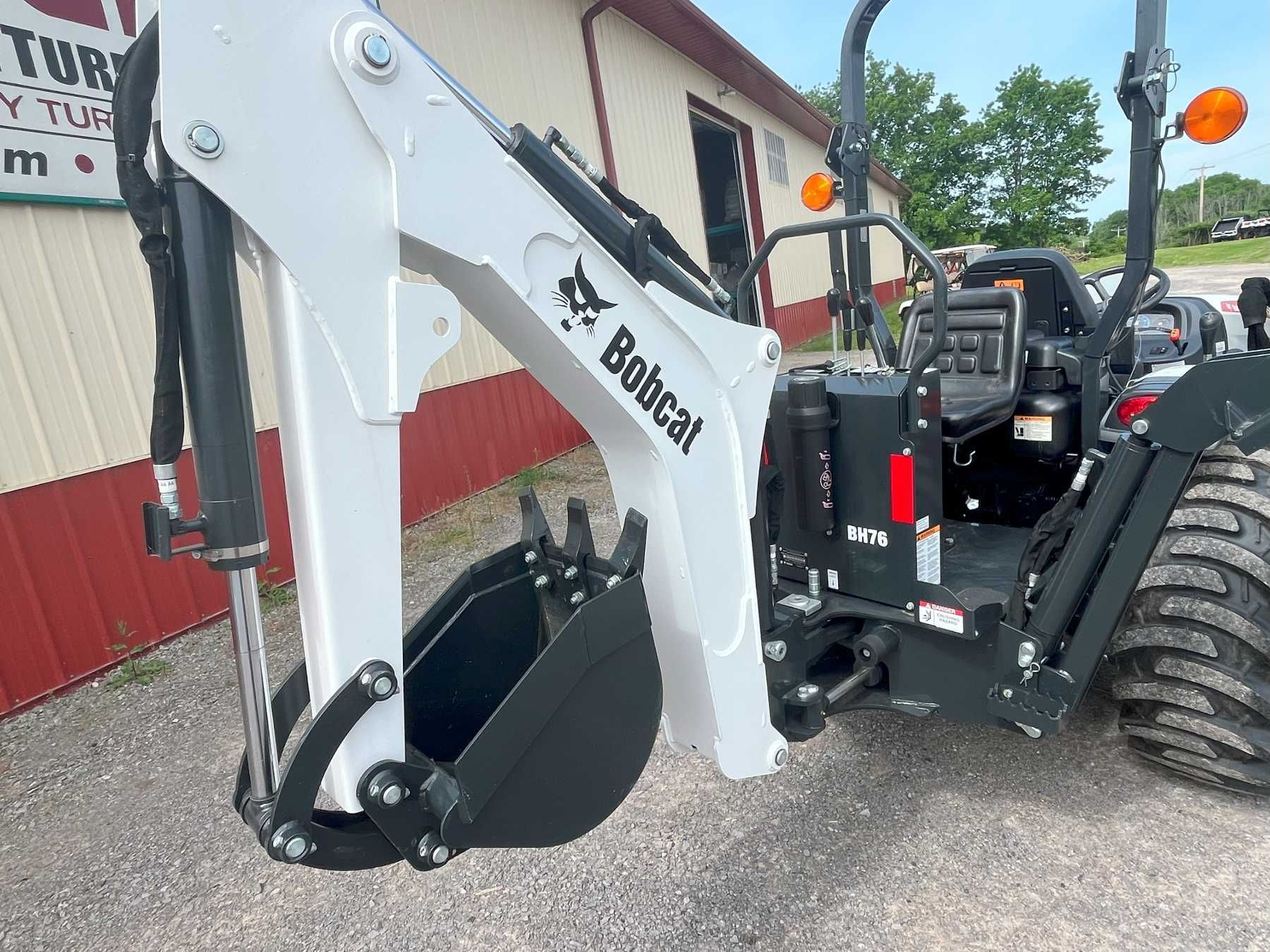 ct2035 with a backhoe