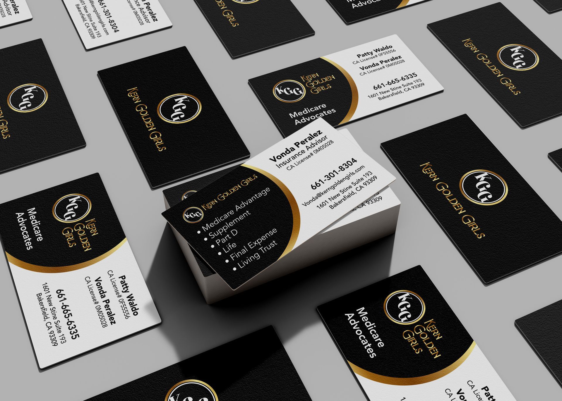 A bunch of business cards for Kern Golden Girls are  stacked on top of each other