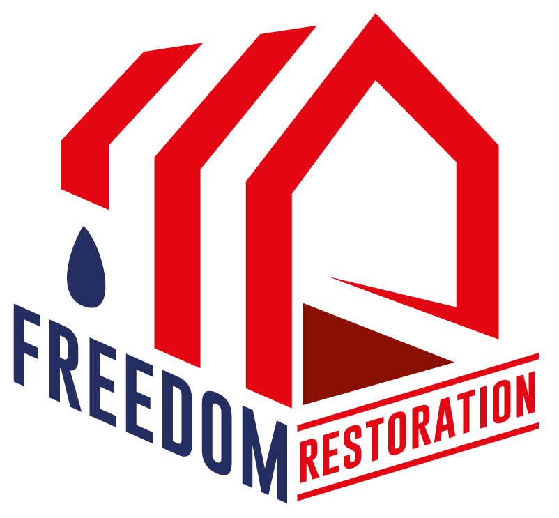 The logo for freedom restoration shows a house with a drop of water on it.