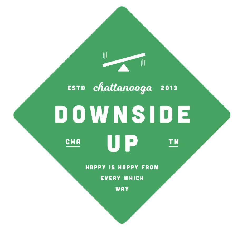 A logo for downside up in chattanooga tn