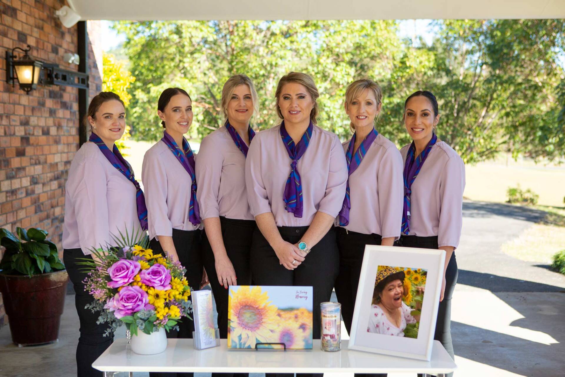 Team Picture In Lavender Uniform | Coffs Harbour, NSW | Lavender Rose Funerals