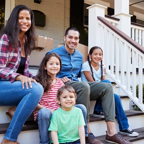 family on house front porch