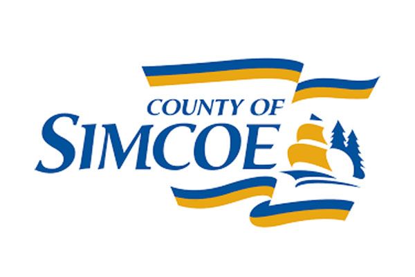 The logo for the county of simcoe is blue and yellow