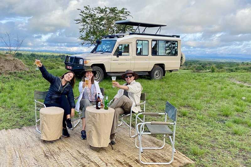Couple having romantic dinner at Ishasha