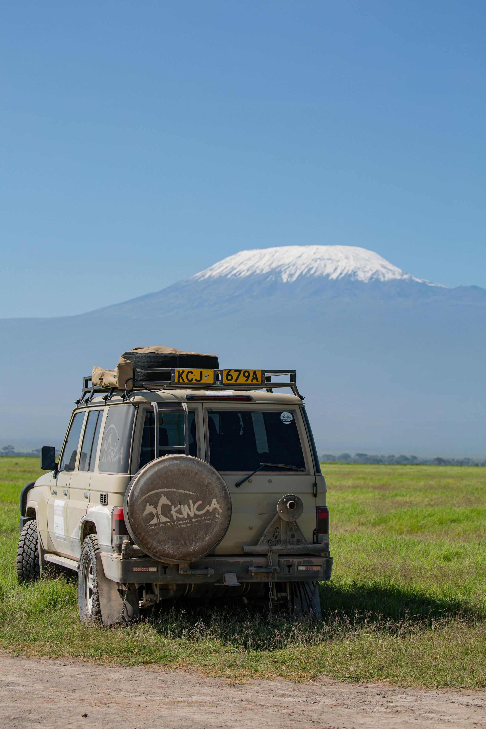 Safari Jeep with Mount Kilimanjaro in the Background