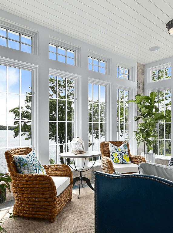 full length white windows in sunroom 