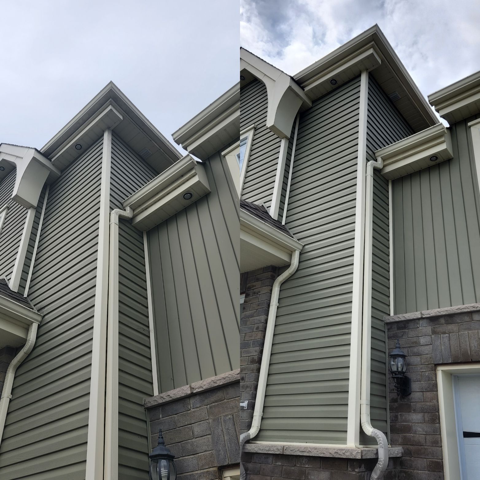 Une maison avec un revêtement vert et des garnitures et gouttières blanches.