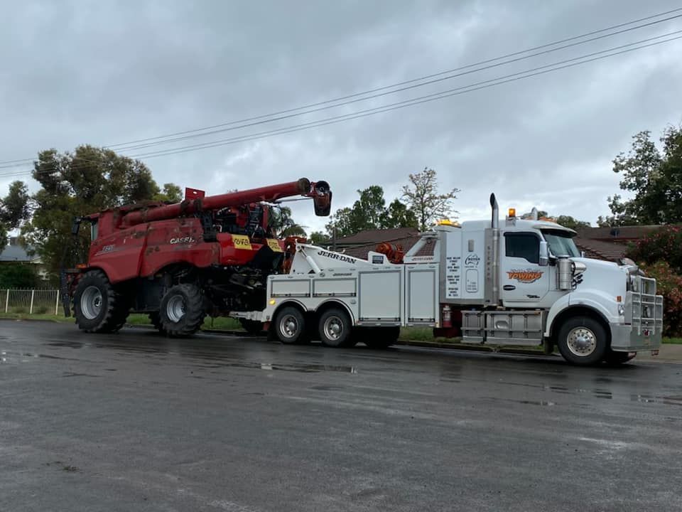 Tow Truck Towing Red Truck — Towing Service In Coonabarabran, NSW