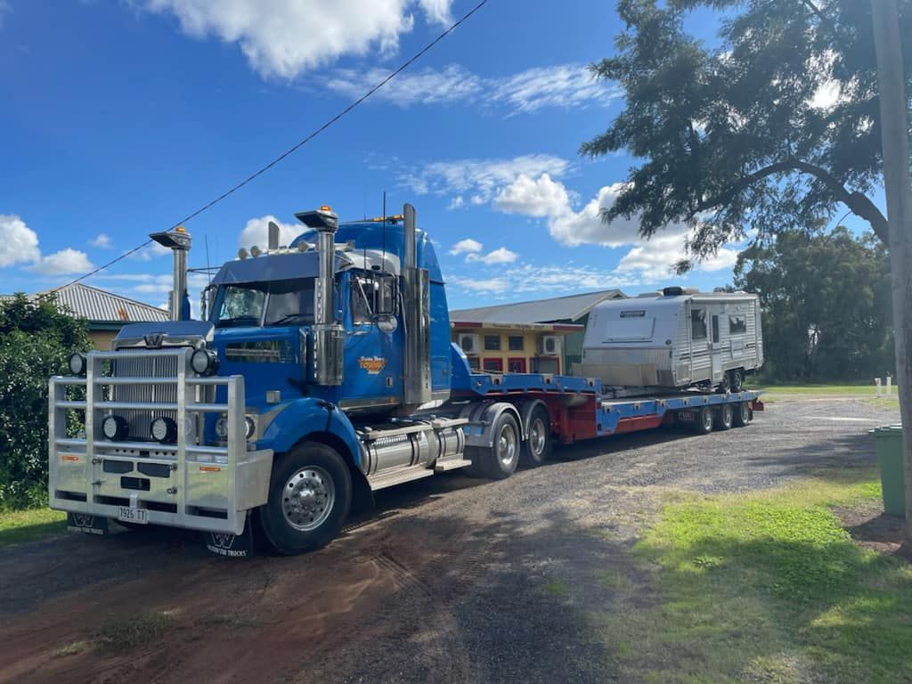 Tow Truck Transporting The White Caravan — Towing Service In Coonabarabran, NSW