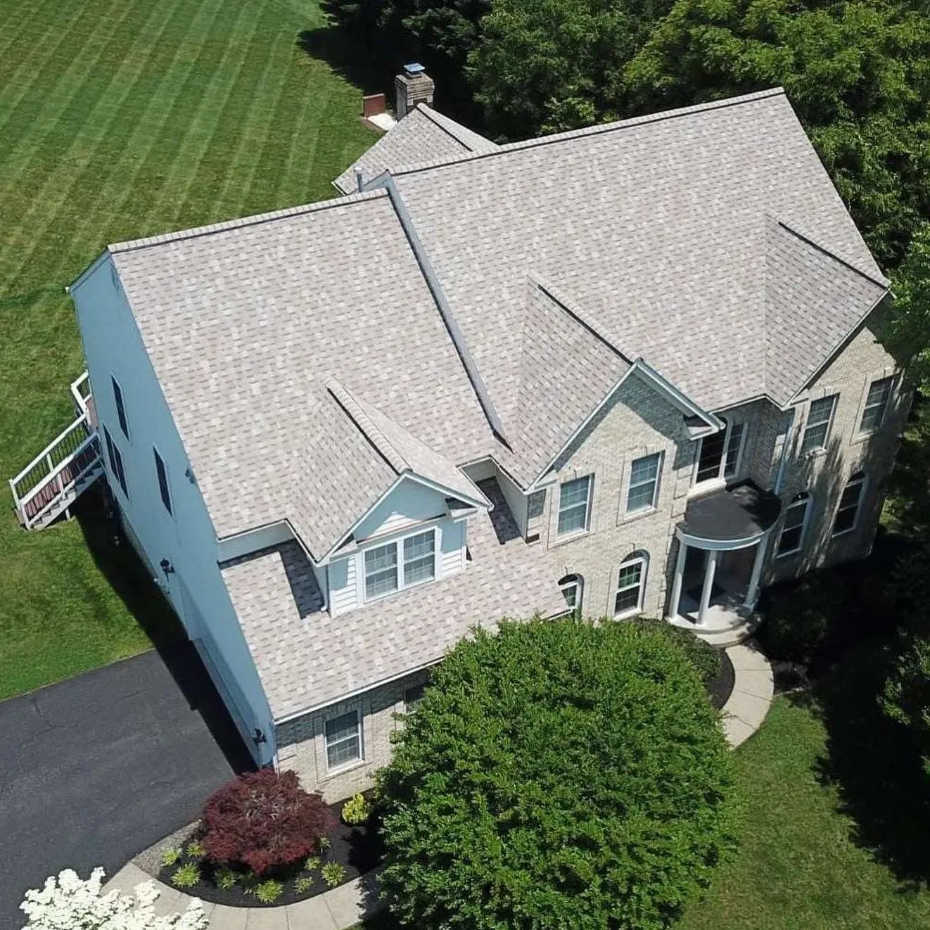 New asphalt roof with ridge vent and modern ventilation system | Four Seasons Roofing in Maryland