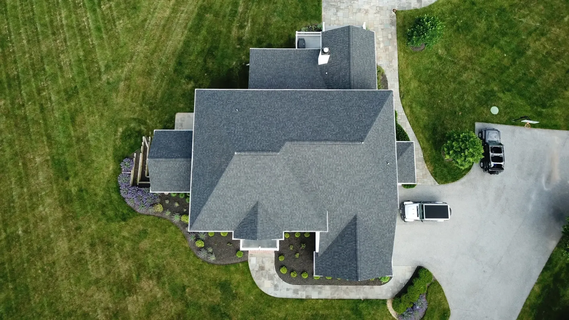 view from above of a house with a new Four Seasons roof