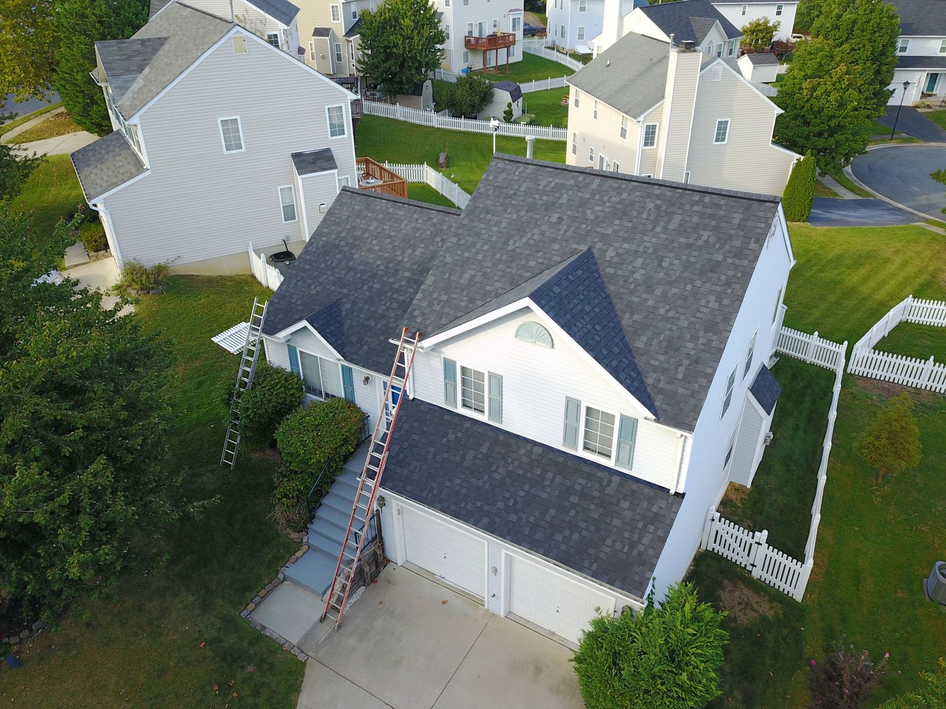 Aerial view of a second story residential roof installed by Roofing Company Four Season Roofing