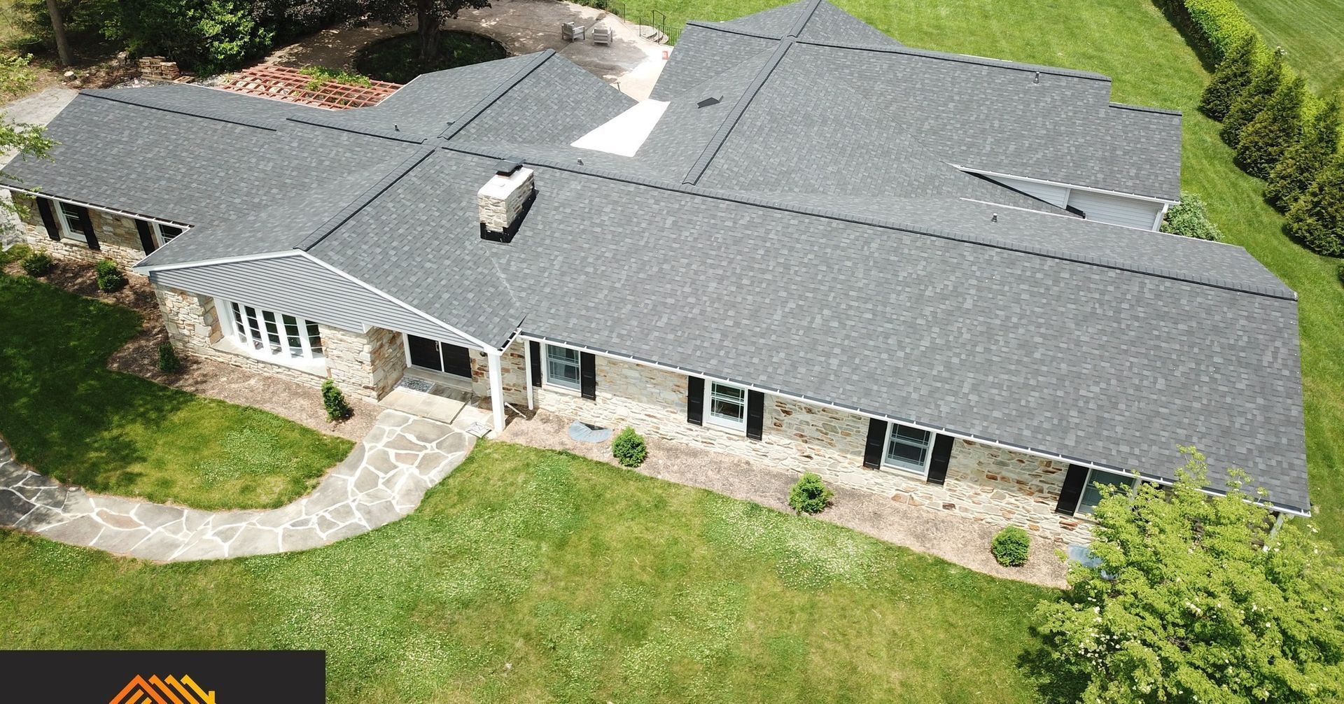 Roof replacement in Finksburg, MD with modern, heat-resistant shingles by Four Seasons Roofing
