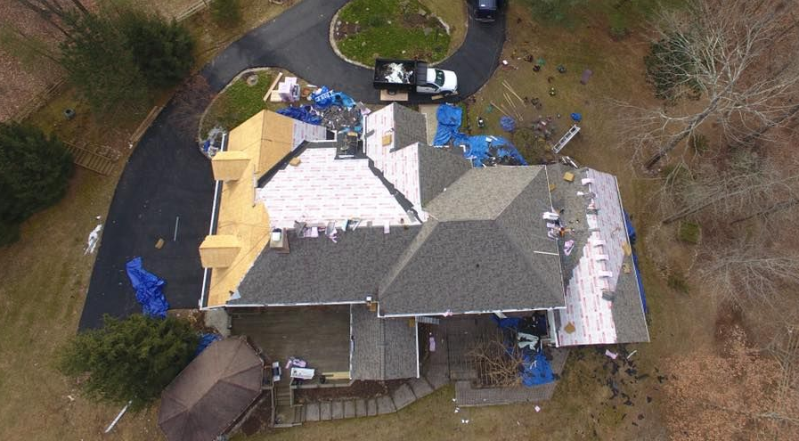 Fall Roof replacement underway in Maryland by Four Seasons Roofing