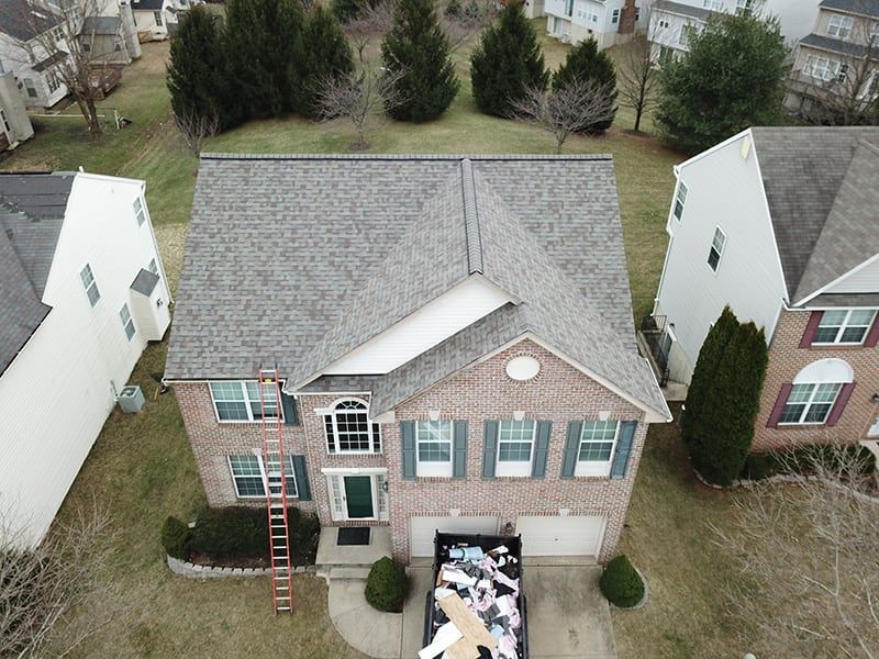 Roofer in Maryland installed a beautiful architectural shingle roof on a large residential home.