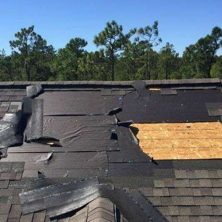 Professional roofing contractor in Finksburg, MD performing roof repair to prevent summer heat damage.