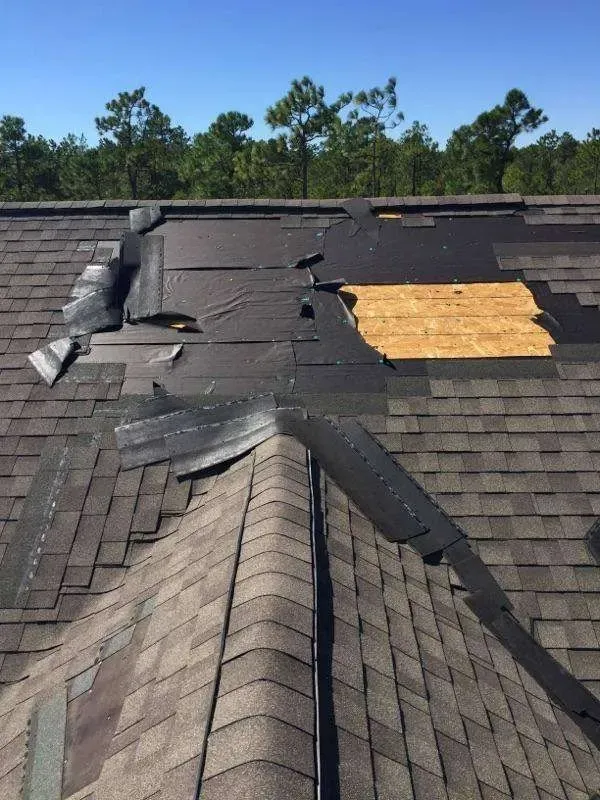 Four Seasons Roofing performing expert roof repair on a residential home in Maryland, ensuring long-term durability and protection.