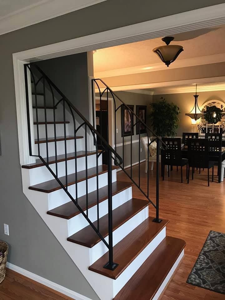 A staircase leading up to a dining room in a house