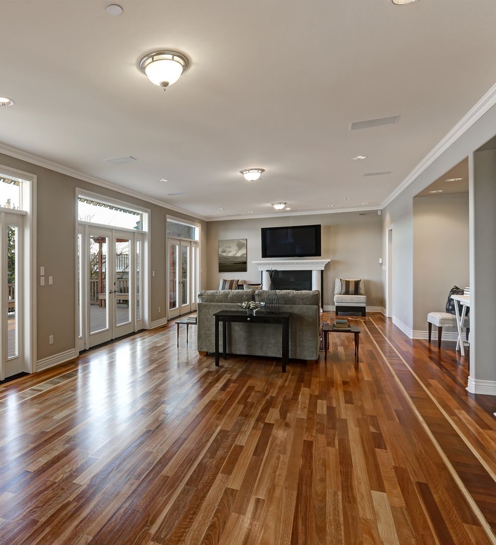 Living Room With Shiny Hardwood Flooring