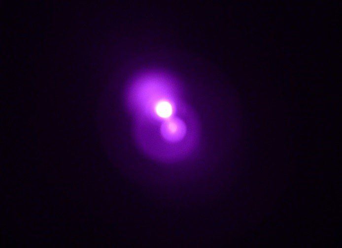 IR beam from a TV remote, usually invisible