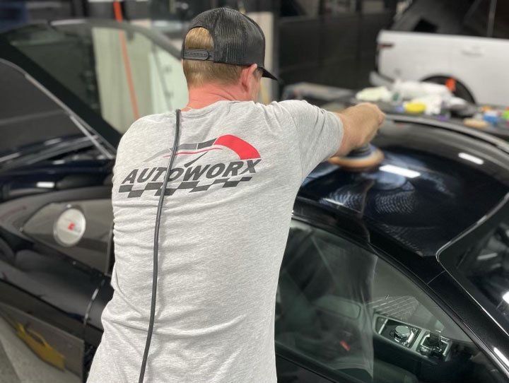 Man ceramic coating top of car