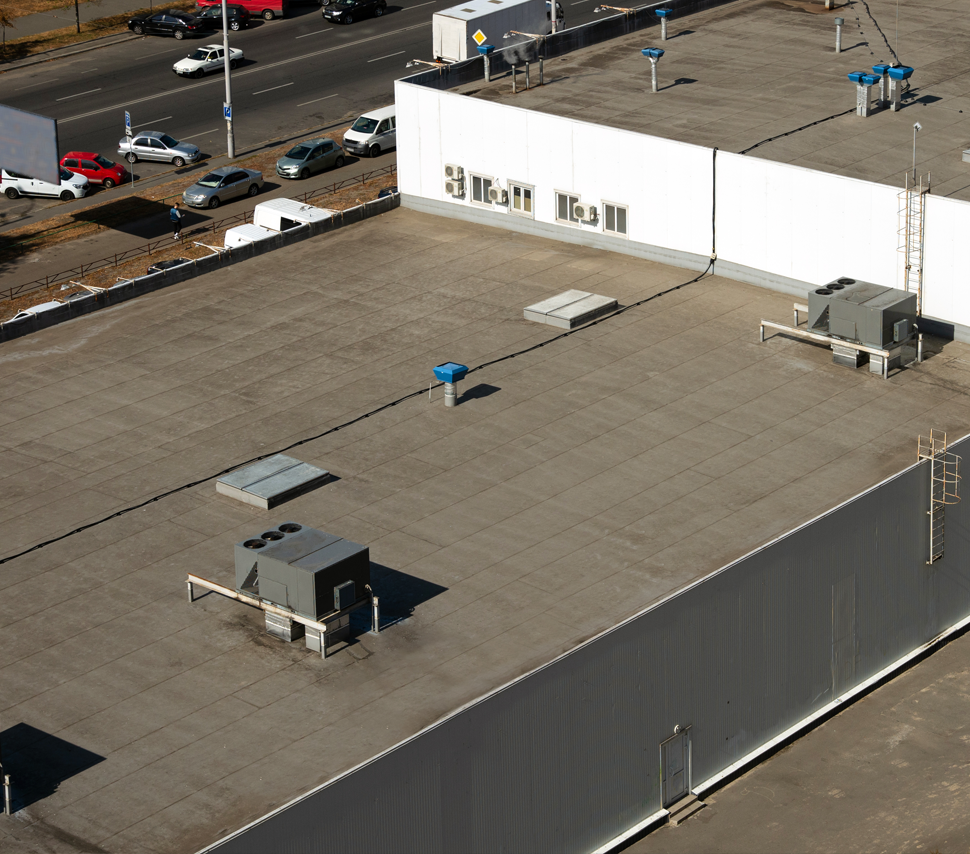An aerial view of the roof of a building with the word ball on it