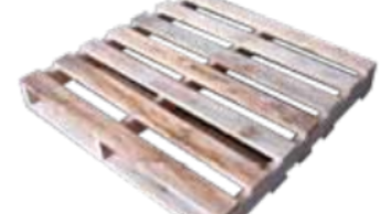 A wooden pallet is sitting on a white surface. A wooden pallet is sitting on a white surface.