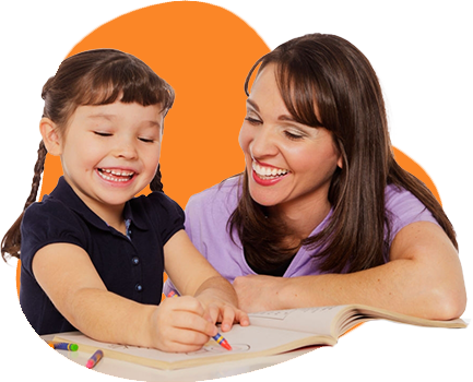 A woman is helping a little girl with her homework