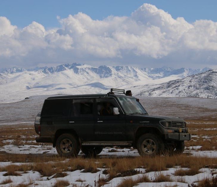Black Land Cruiser on Mountains