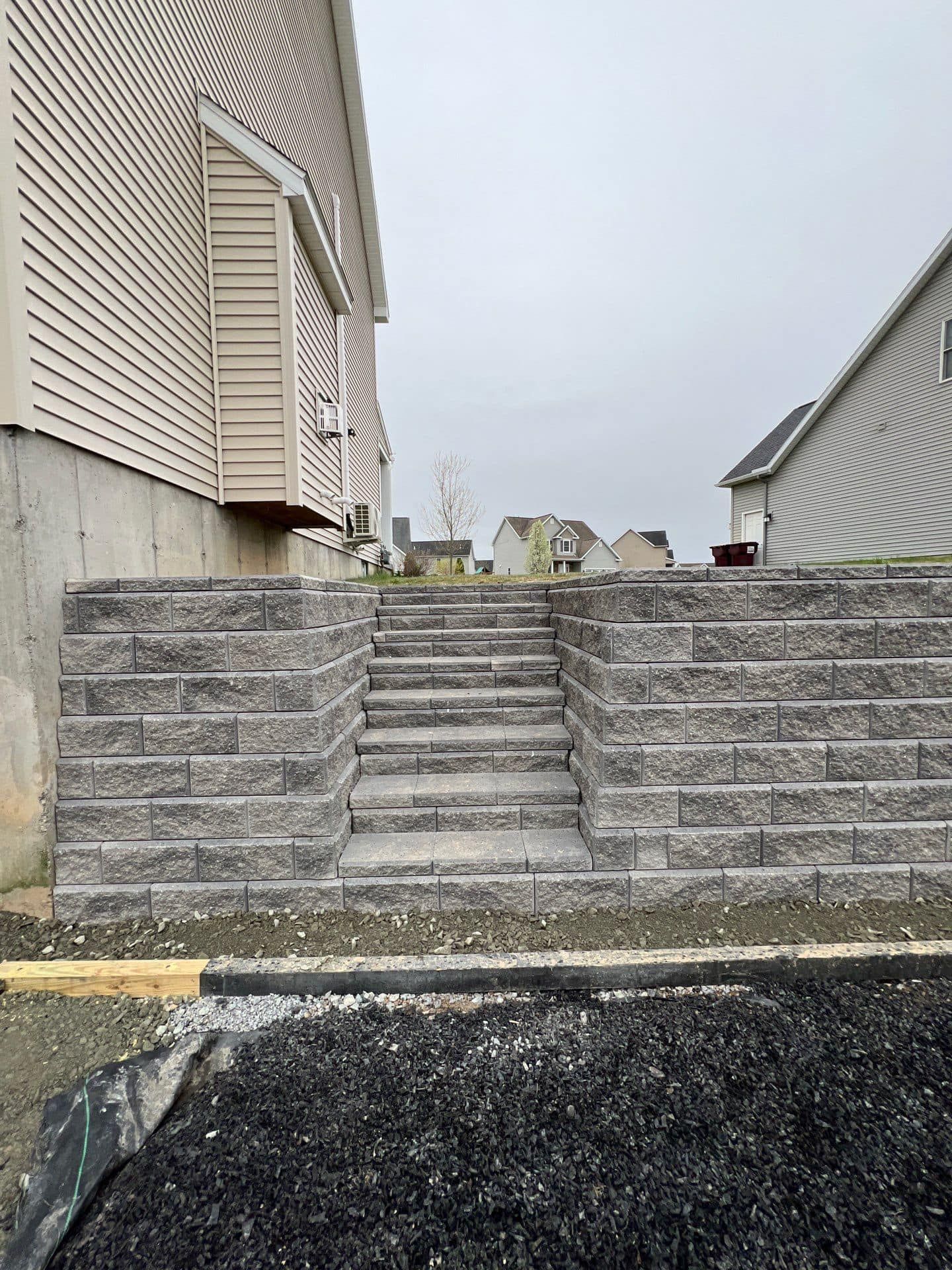 A set of stairs leading up to a house.