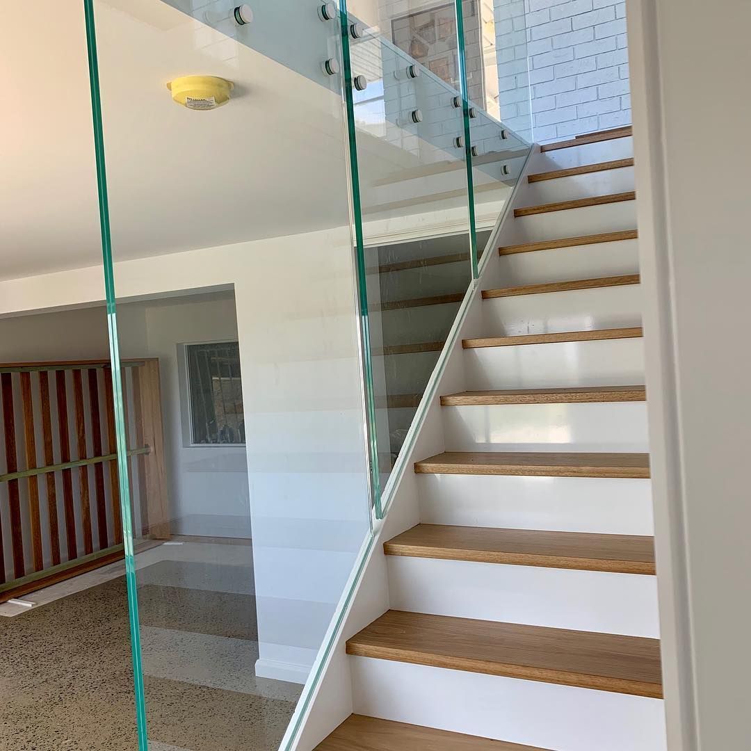 A Staircase With Wooden Steps and a Glass Railing — Swift Glass & Aluminium In Yamba, NSW