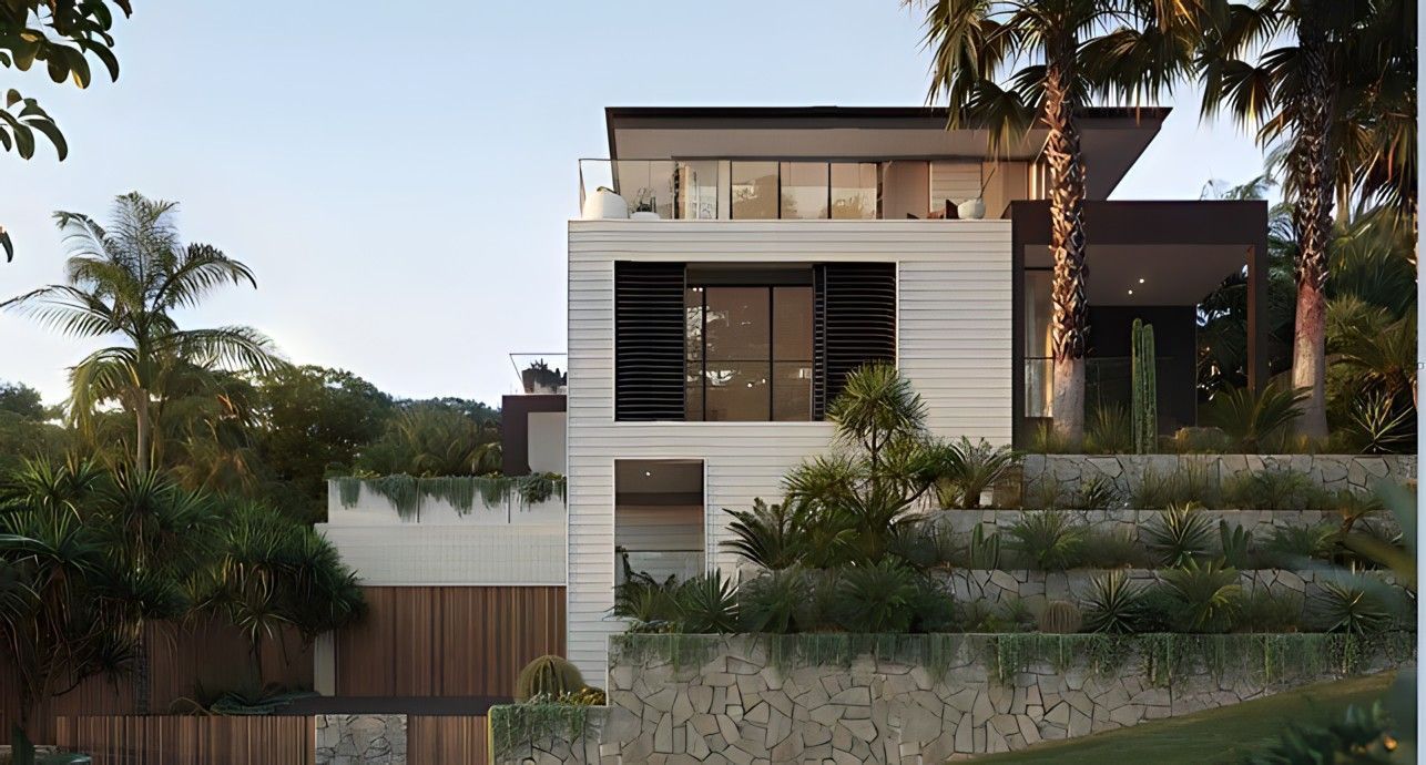 A Modern Multi-story House With Stone Facade, Tiered Landscaping — All Coast Painting in Tweed Heads South, NSW