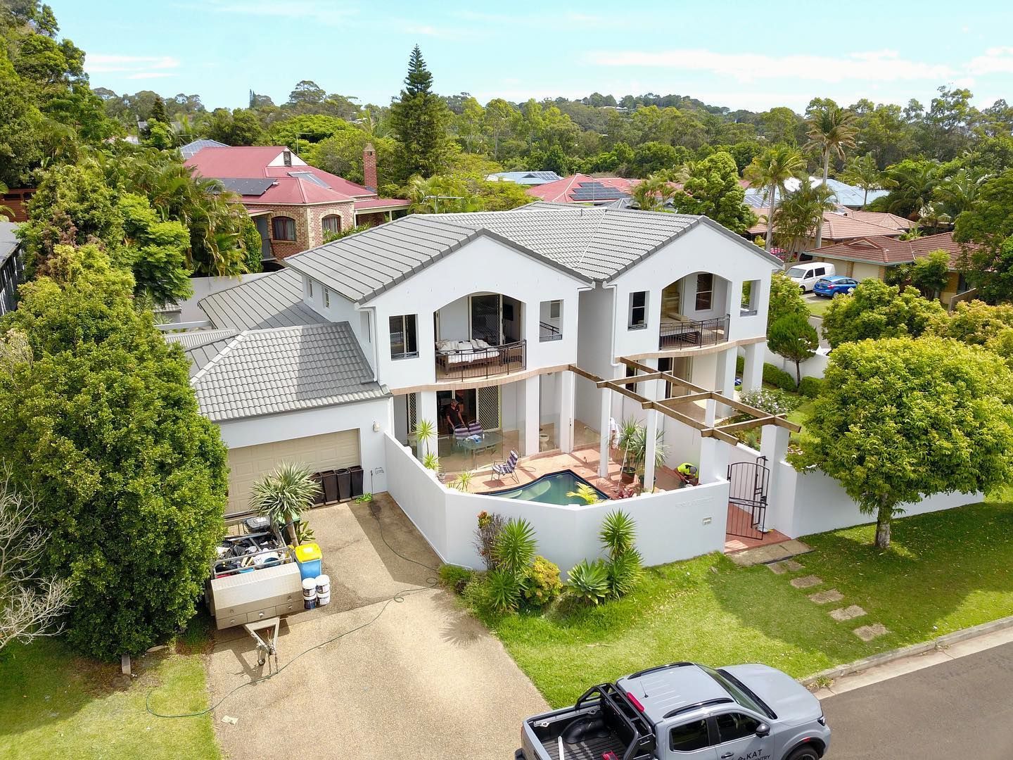 Two-story White House With a Pool, a Gray Roof — All Coast Painting in Tweed Heads South, NSW