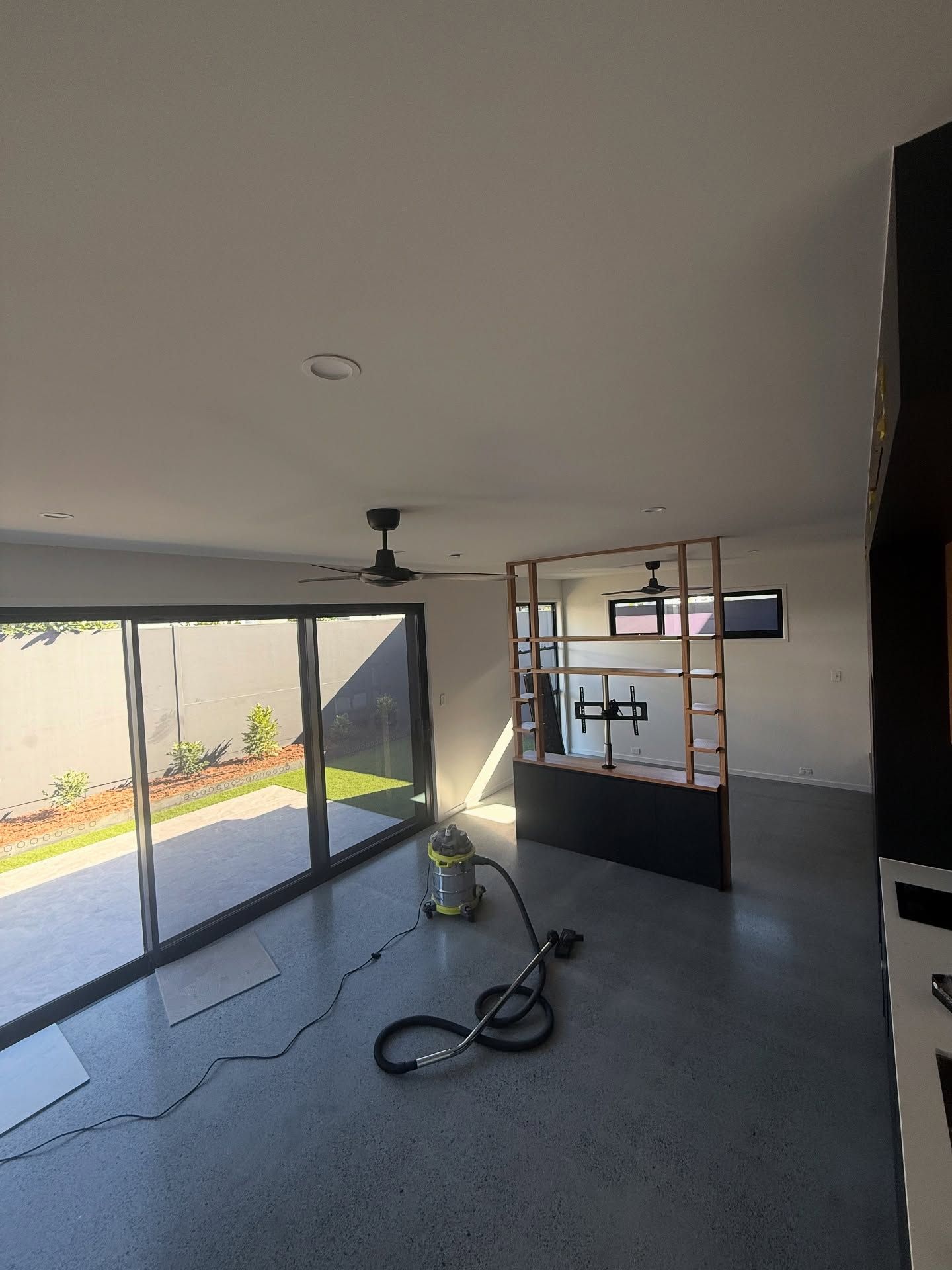 Modern Kitchen With Concrete Island and New Painted Walls — All Coast Painting in Tweed Heads South, NSW