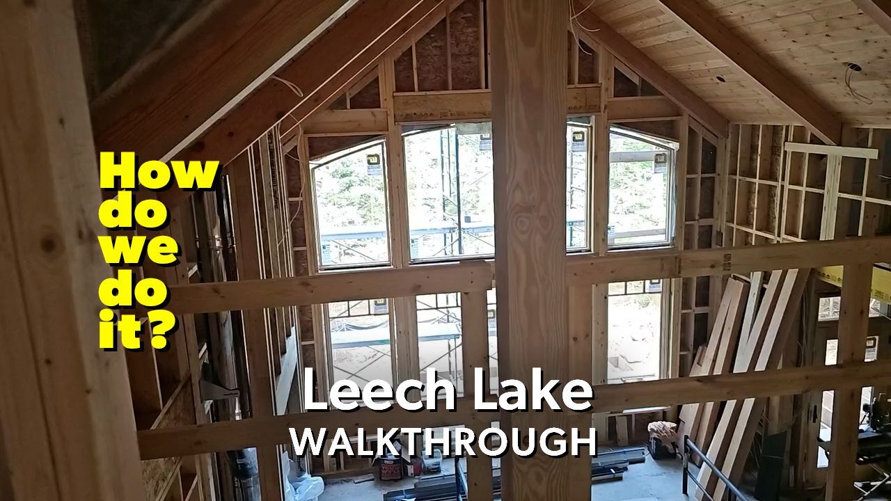 Leech Lake cottage showing construction of large windows and balcony.