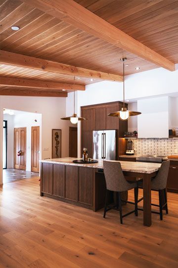 An open floorplan with wide spaces show accessibility in this family cottage.