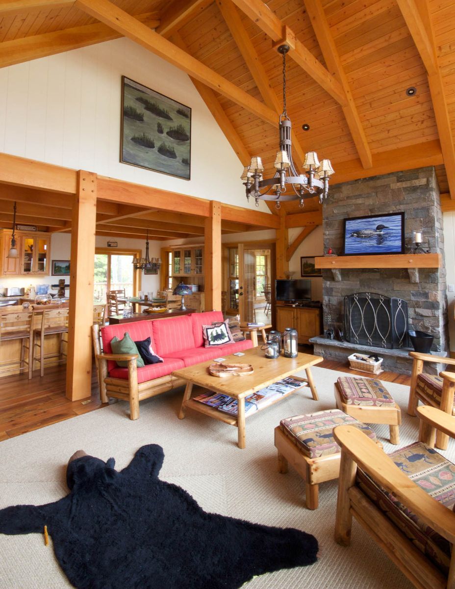 Custom Muskoka Cottage featuring a  living room with a bear rug on the floor