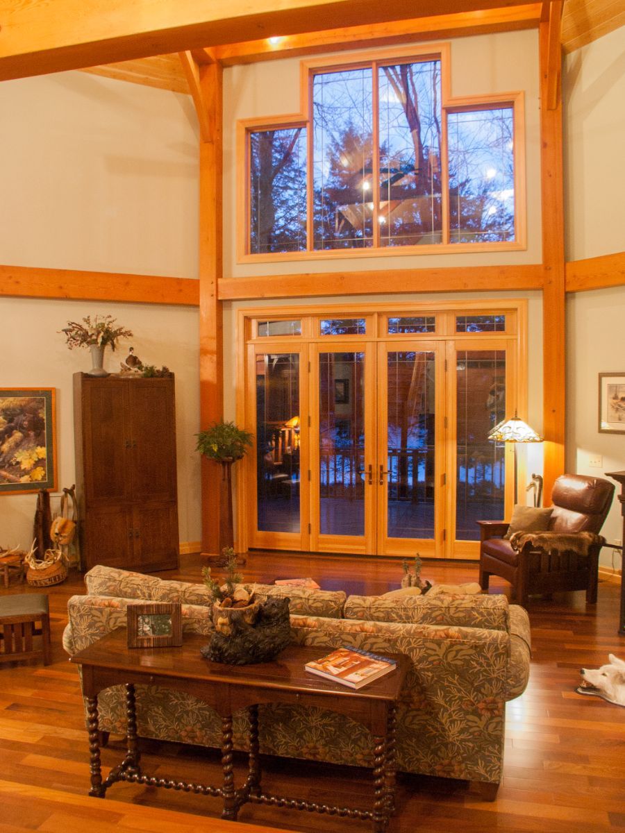 Custom Muskoka Cottage featuring a  living room with a couch and a table