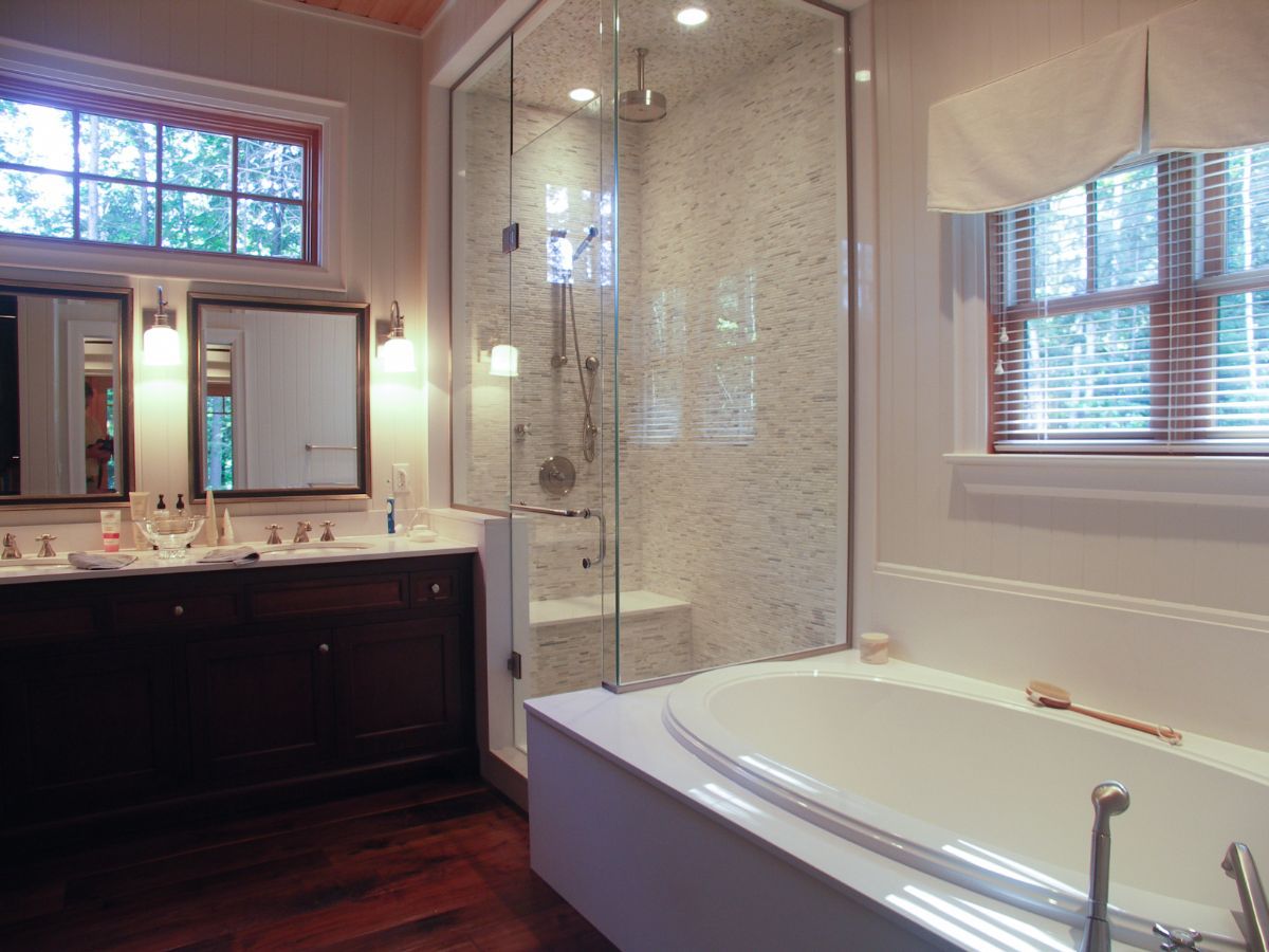 Custom Muskoka Cottage featuring a  bathroom with a bathtub and a walk in shower