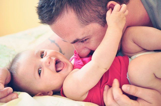 Father and a laughing baby