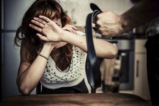 Woman in a domestic abusive relationship needing a divorce lawyer near Bridgeport, CT