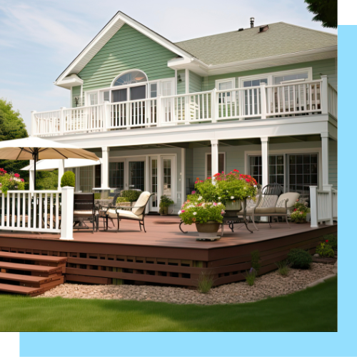 A large house with a large deck and umbrellas