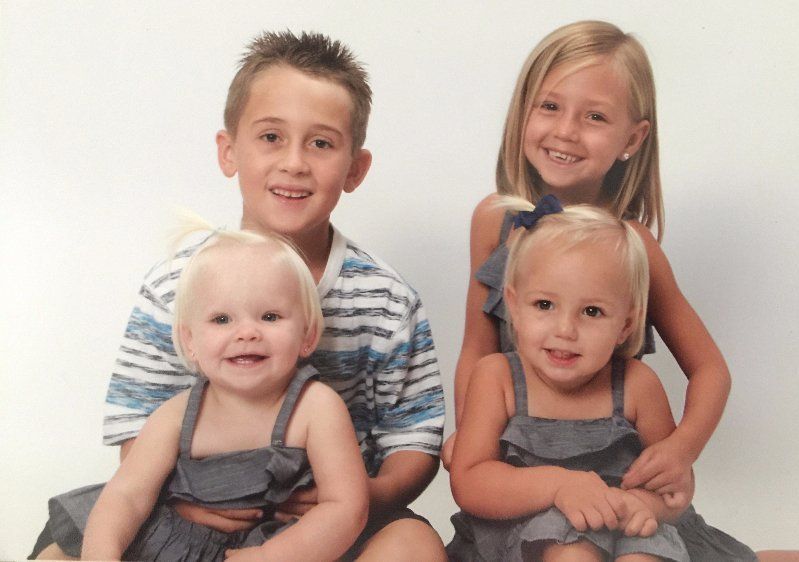 Children Smiling On Camera — Palm Beach County, FL — East Coast Furniture