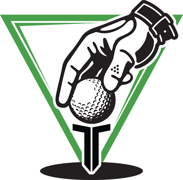 A hand is putting a golf ball on a tee.