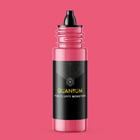 Pink bottle of Quantum tattoo ink, labeled 