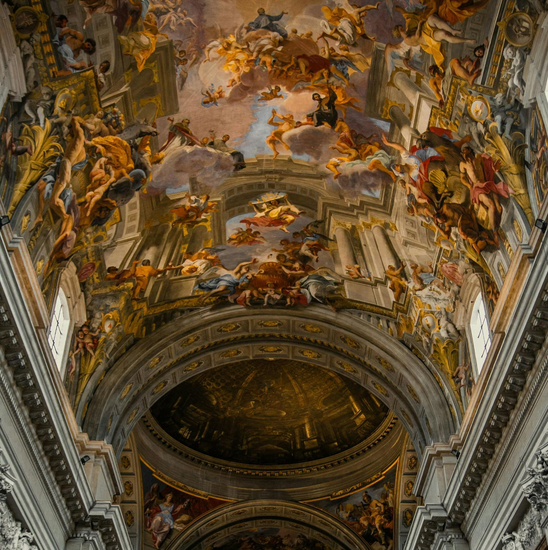 Sant’Ignazio di Loyola ceiling frescoes depicting scenes from the Bible in vivid detail.
