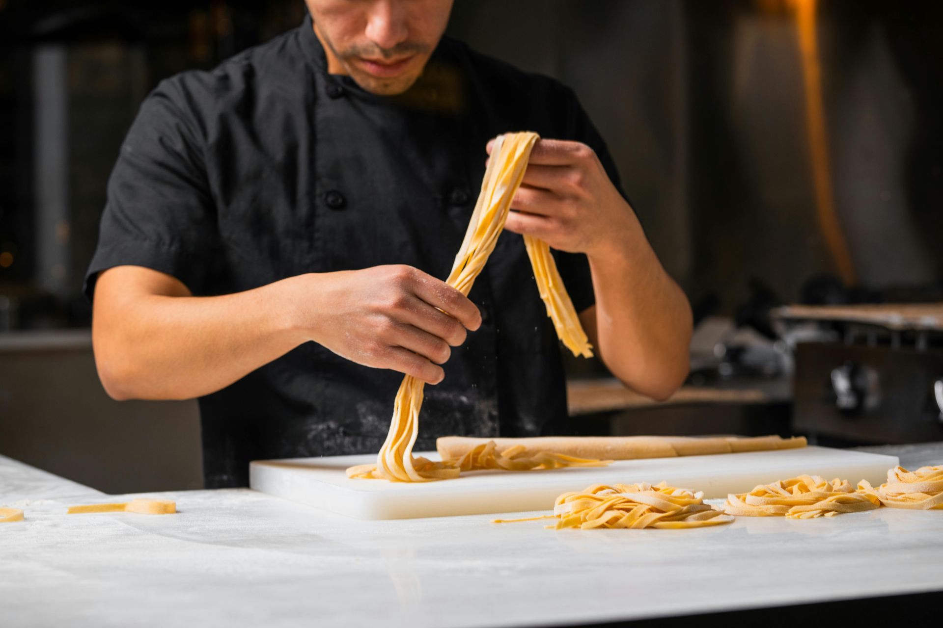 Chef making home-made gluten free pasta in Rome