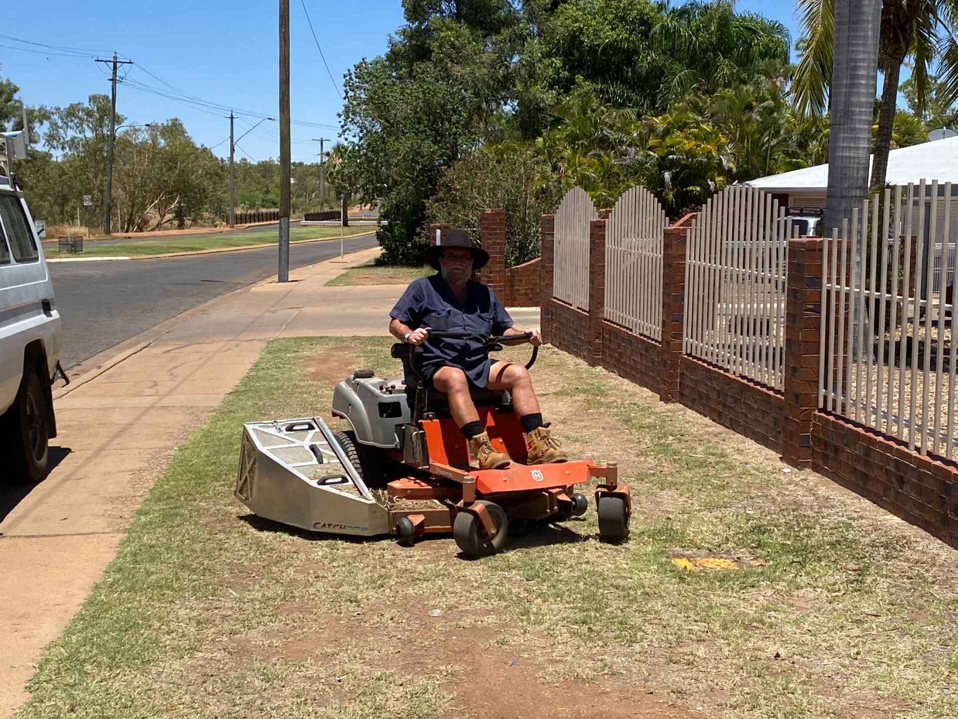 Man Using Mowing Machine 2 — Gallery in Mount Isa, QLD