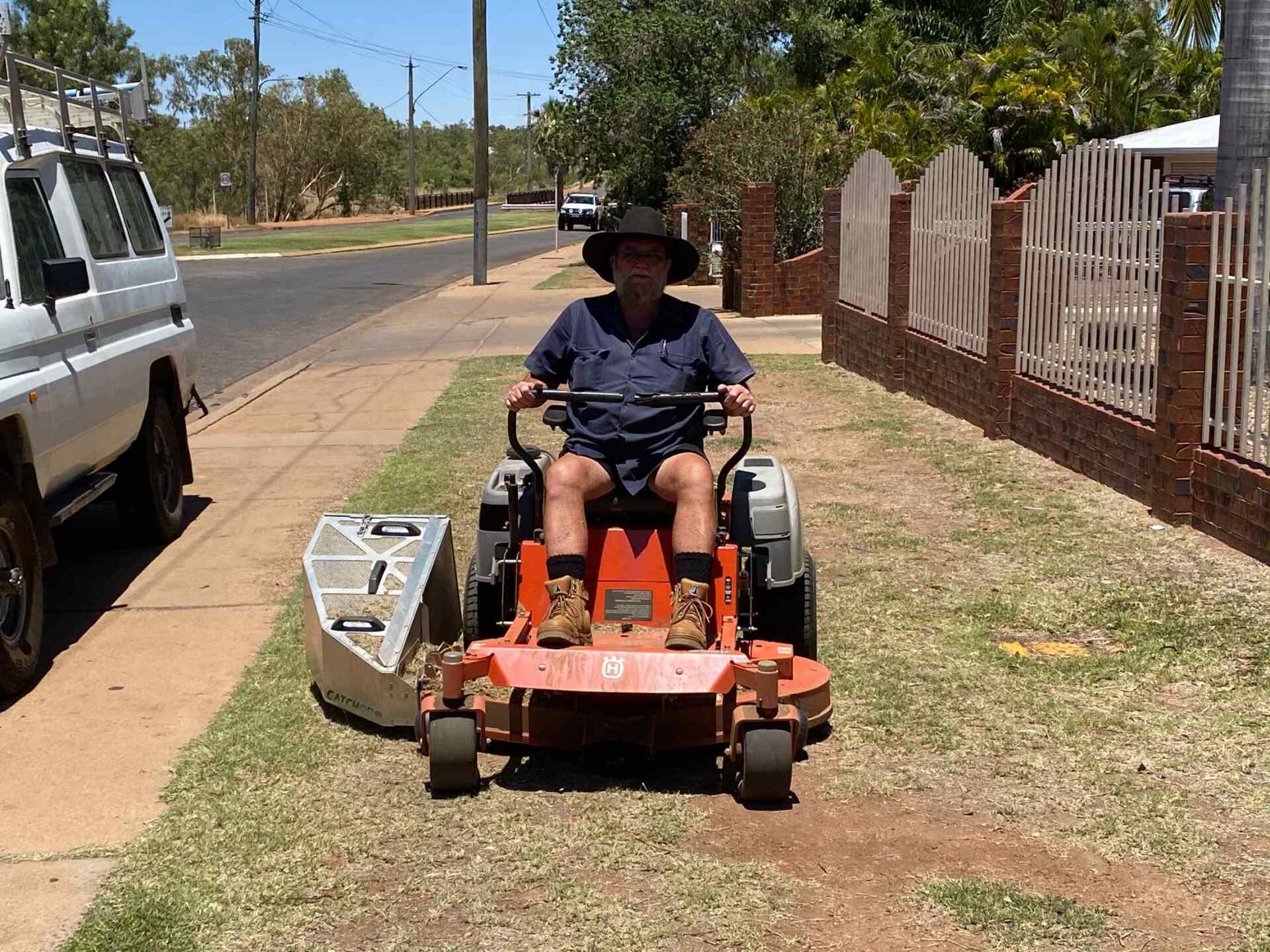Man Using Mowing Machine — Gallery in Mount Isa, QLD