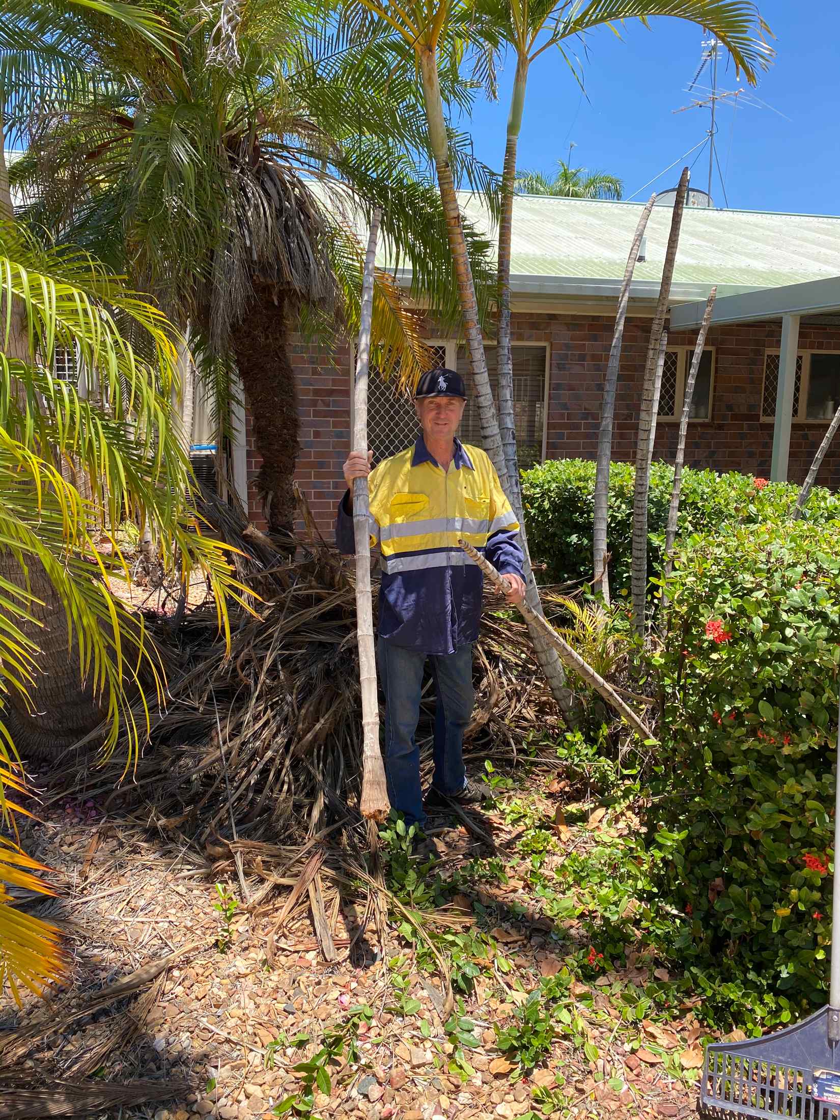 Man Cleaning Yard — Gallery in Mount Isa, QLD